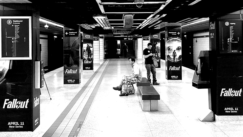 A subway station with to Amazon Fallout ads.